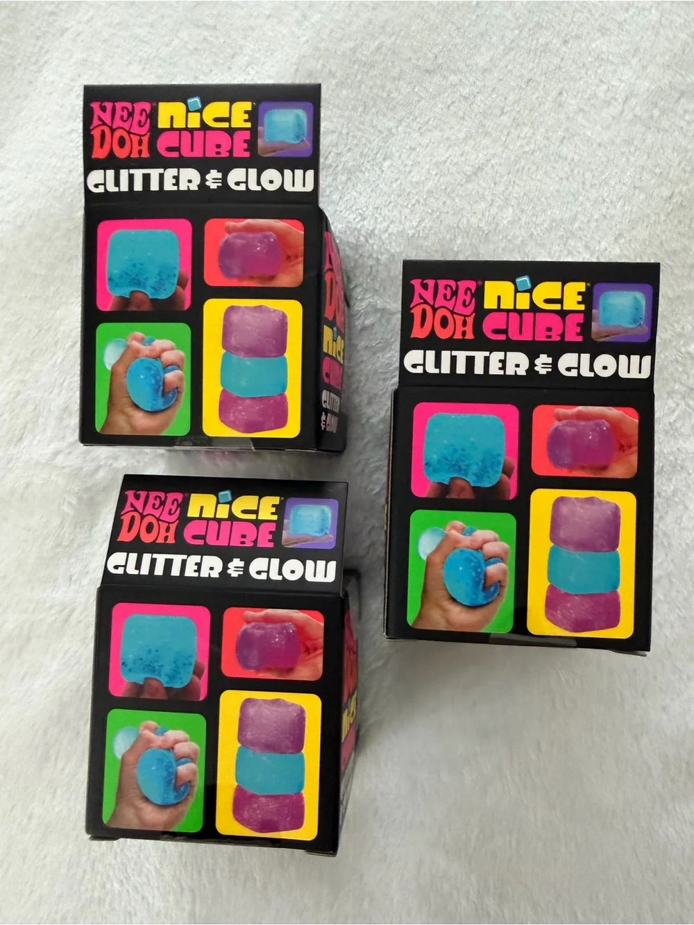 Set of Needoh Nice Cube Glitter & Glow Squishy Toys - Purple and Blue